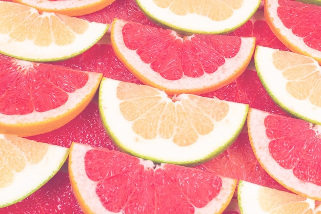 Fondo succoso delle fette del pompelmo e del pomelo