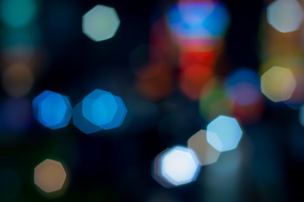 Fondo vago astratto del bokeh dell&#39;ottagono della geometria di scintillio.