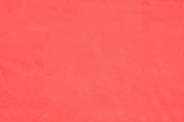 Fondo verticale della tela del tessuto di cotone rosso rosa