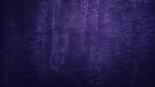 Fondo viola scuro astratto di struttura della parete del grunge