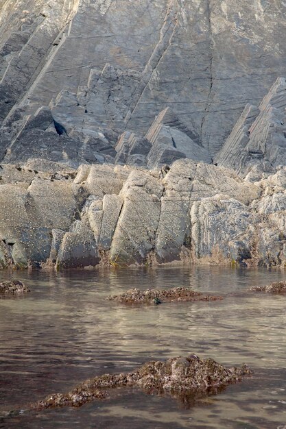 Formazione rocciosa e oceano a Odeceixe Beach, Algarve, Portogallo