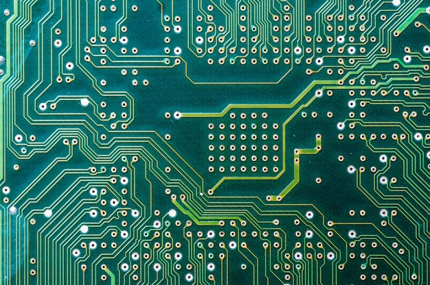 Foto del primo piano del circuito verde del computer per uso come fondo.