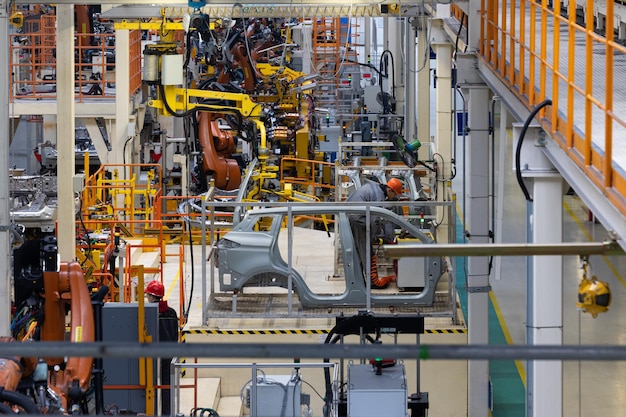 Foto della linea di produzione automobilistica saldatura della carrozzeria dell'auto moderna industria automobilistica dell'impianto di assemblaggio di automobili