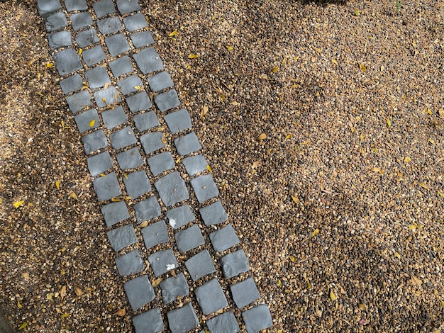 Foto di texture di sfondo vista dall'alto di un sentiero di pietra nel giardino