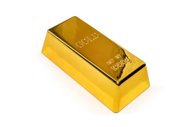 Foto di un lingotto d'oro da 1 kg isolato su sfondo bianco