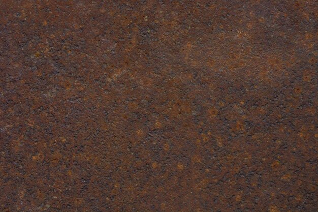 Foto di uno sfondo grunge marrone di consistenza metallica arrugginita