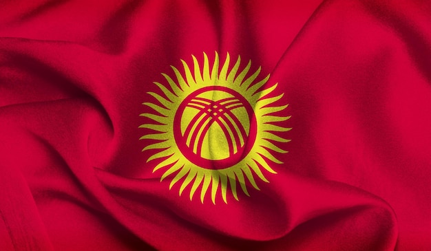 Foto gratis della bandiera del Kirghizistan con la trama del tessuto