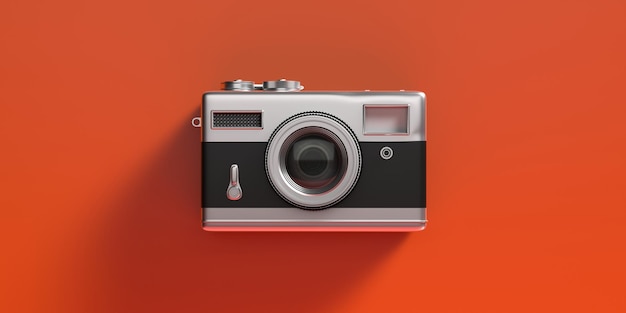 Fotocamera a pellicola vintage isolata su sfondo arancione 3d illustrazione