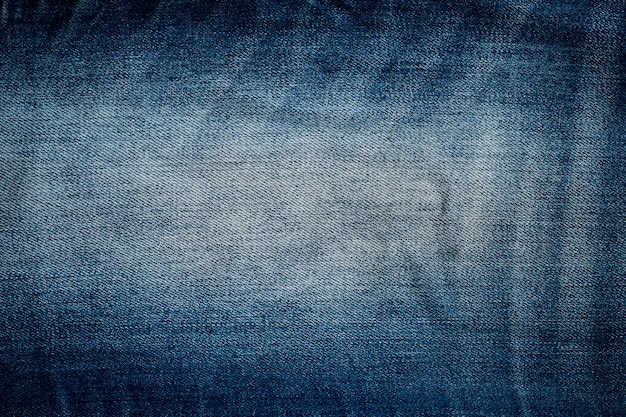 Fotografia del primo piano dello sfondo La trama del grunge stile blue jeans