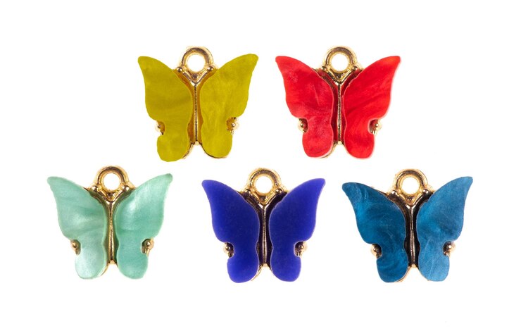 Photo four colorful butterflies are shown with gold rings