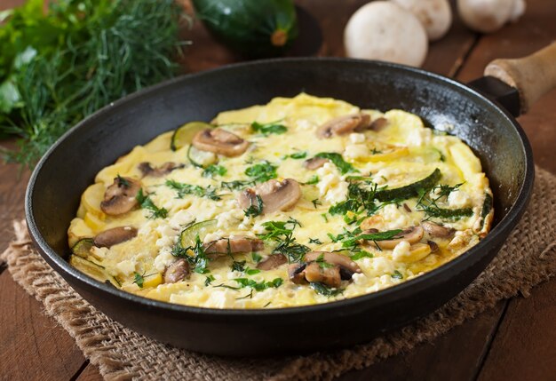 Frittata con funghi, zucchine e formaggio