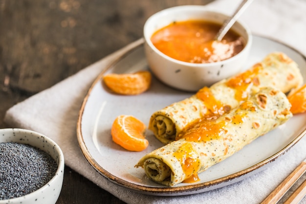 frittelle con semi di papavero e marmellata di mandarini