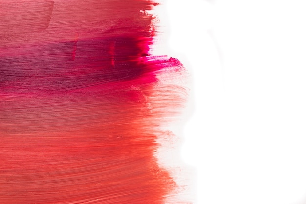 From light to deep colour lipstick texture.  Isolated on white. Copy space.