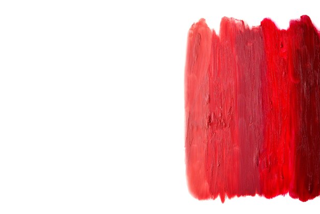 From light to deep colour lipstick texture.  Isolated on white. Copy space.