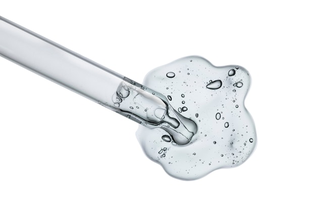 gel liquido o siero su uno schermo di microscopio bianco isolato sfondo grigio