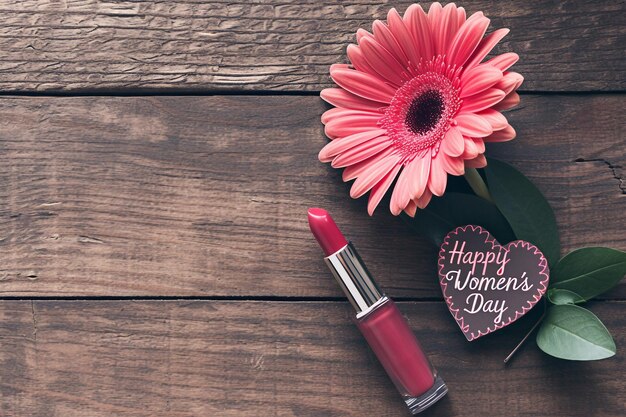 Gherbera Flower Lipstick e Card a forma di cuore che portano felicità Giornata della Donna