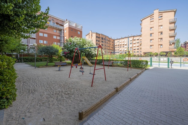 Giardini e parco giochi di un'urbanizzazione con aree comuni