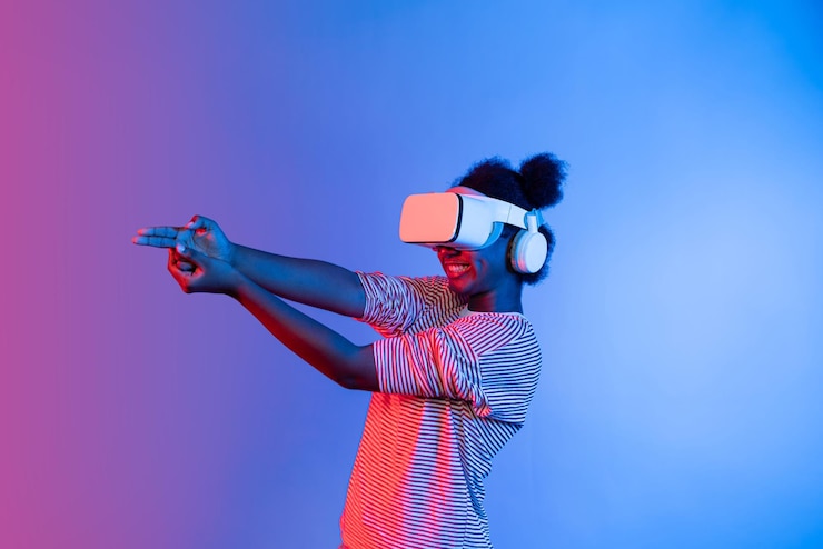 Foto giocatore africano che indossa vr che gira il meta-mondo giocando a sparare con la pistola