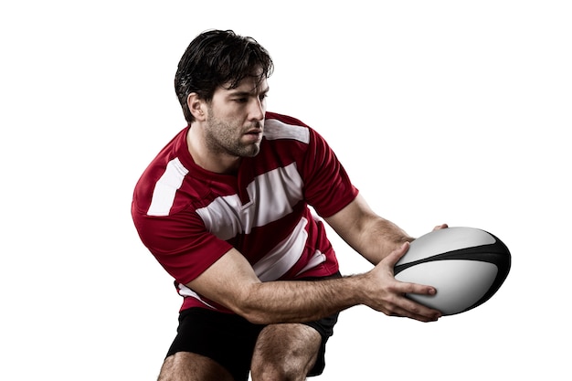 Giocatore di rugby in uniforme rossa.