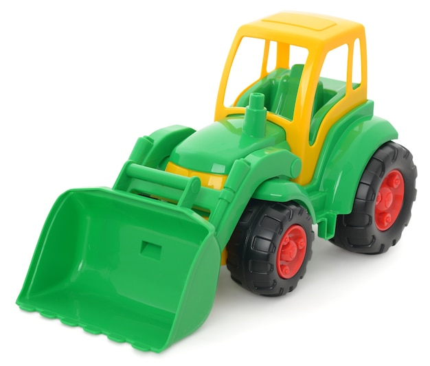 Giocattolo di plastica per bambini, bulldozer giallo-verde isolato su bianco