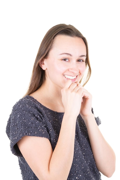 Giovane ragazza mani sul mento sorridente idea di pensiero bella e felice