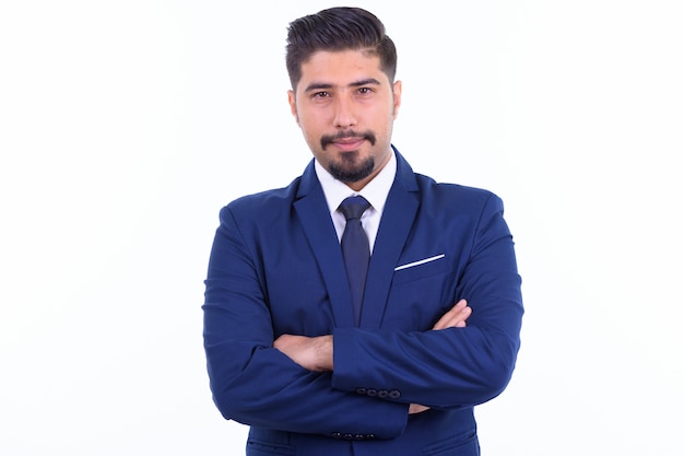 giovane uomo d'affari iraniano barbuto bello in vestito isolato su bianco