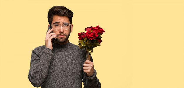 Giovane uomo festeggia il giorno di San Valentino