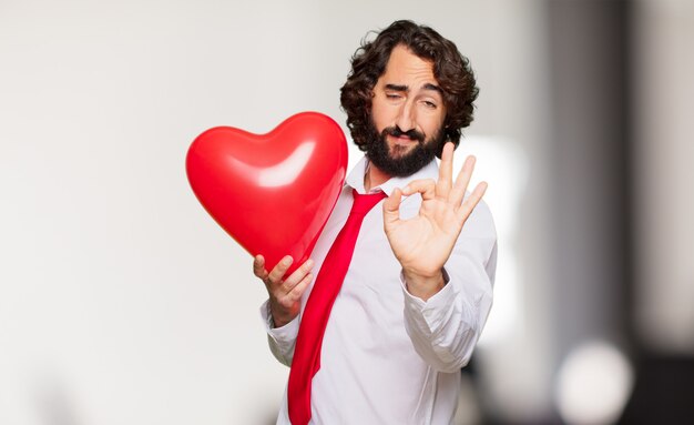 Giovane uomo pazzo concetto di San Valentino