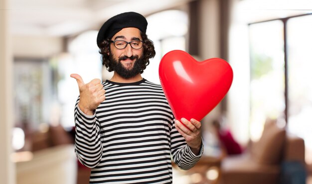 Giovane uomo pazzo concetto di San Valentino