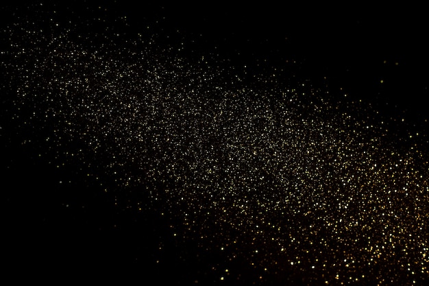 glitter giallo su sfondo nero