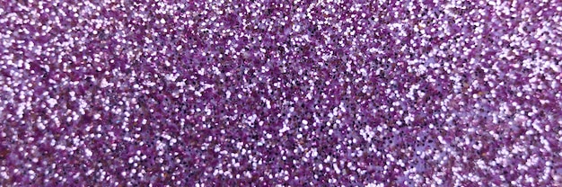 Glitter viola sfocato si chiuda