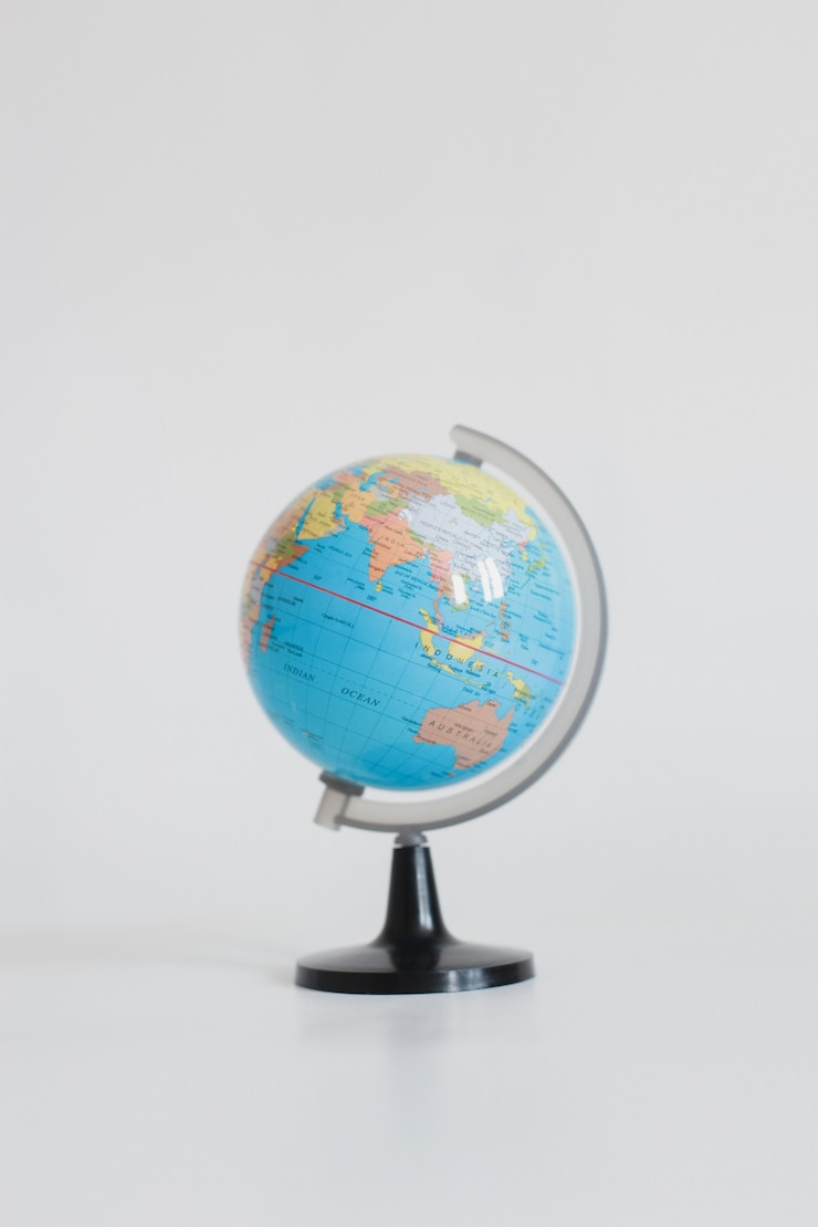 Photo globe with map of many continent and countries isolated on white background