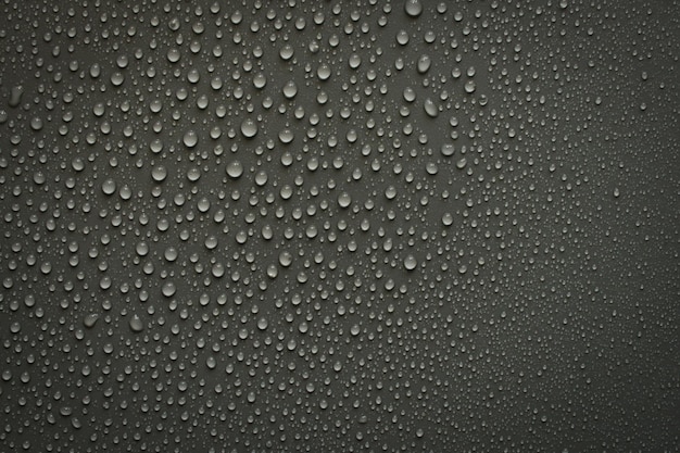 Gocce d'acqua su sfondo nero. Gocce di texture foto macro.