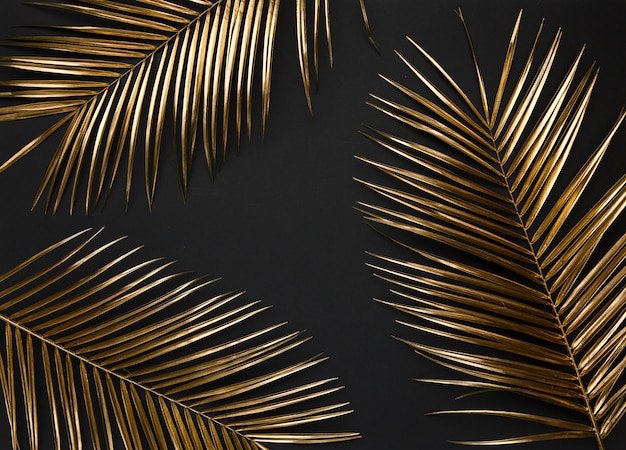 Golden painted date palm leaves