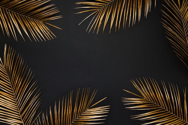golden painted date palm leaves