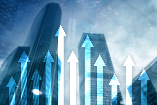 Grafico a freccia in alto sullo sfondo del grattacielo Investimento e concetto di crescita finanziaria