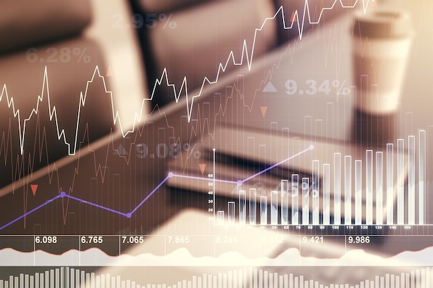 Grafico finanziario creativo astratto sul forex moderno del fondo del computer portatile e sul concetto di investimento Multiesposizione