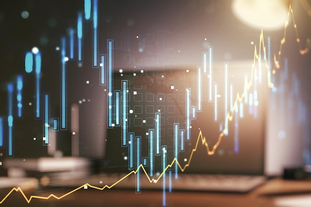 Grafico finanziario creativo astratto sullo sfondo del portatile moderno Forex e concetto di investimento Multiesposizione