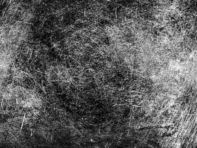 Grunge texture nera La trama dei graffi sul metallo Texture graffi sfondo monocromatico Ruvido sfondo duro con texture La superficie è danneggiata