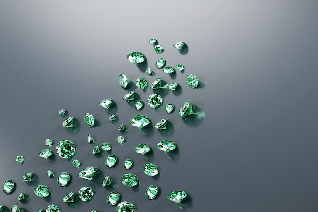 Gruppo di diamanti verde smeraldo posto su sfondo lucido 3d'illustrazione