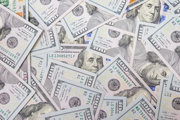 Gruppo di soldi pila di 100 dollari di banconote un sacco di vista dall'alto della trama di sfondo