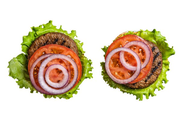 Hamburger vegano con cotolette senza carne a base vegetale polpette di pomodoro e cipolla isolati su sfondo bianco