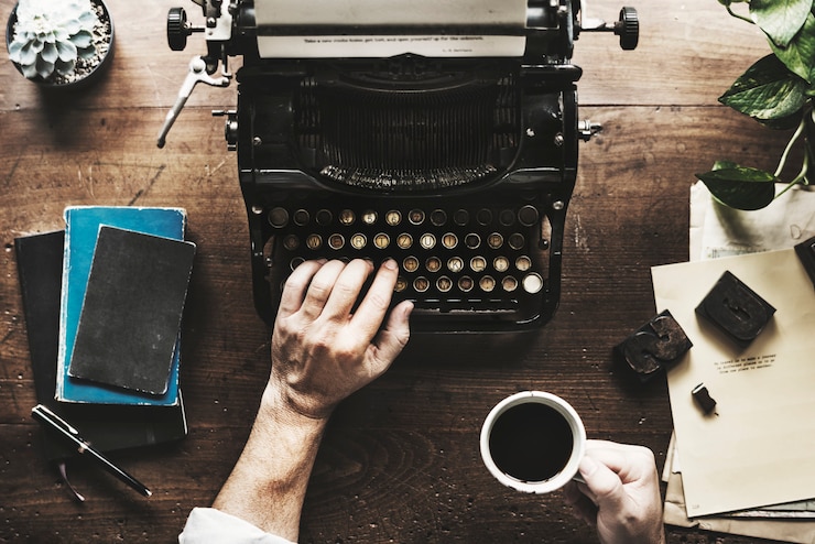 Photo hand typing retro typewriter machine work writer