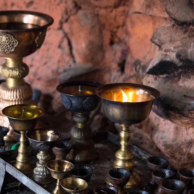 Iconlamps in gompa tibetano a Leh Ladakh India