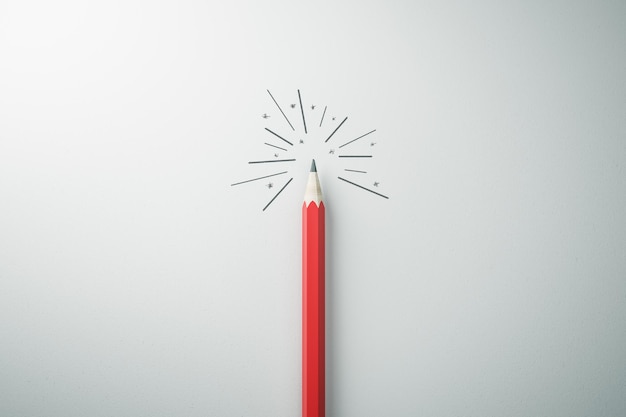 Idea di indipendenza e concetto di leadership con matita rossa velata sotto una lampadina accesa su sfondo chiaro Rendering 3D