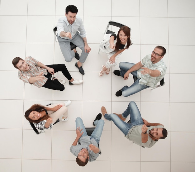 Il capo della vista superiore e il team aziendale che puntano su di te il concetto di scelta