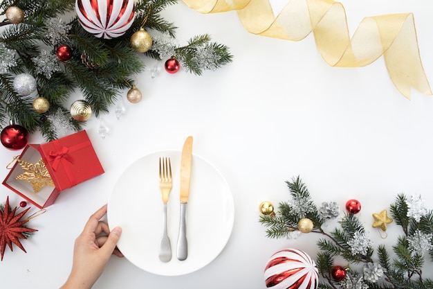 Il fondo della cena della tavola del partito del nuovo anno di Natale celebra il tempo