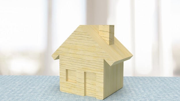 Il legno di casa sul tavolo per il rendering 3d del concetto di proprietà o immobiliare