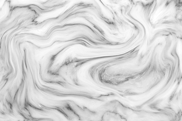 Il motivo di sfondo della trama delle onde di marmo grigio bianco può essere utilizzato per la carta da parati o la piastrella della parete della pelle lussuosa o la custodia per la copertura dello schermo del telefono cellulare