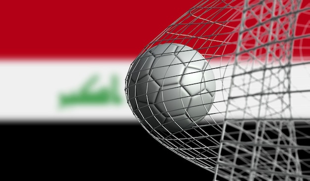 Il pallone da calcio segna un gol in una rete contro il rendering 3D della bandiera dell'Iraq